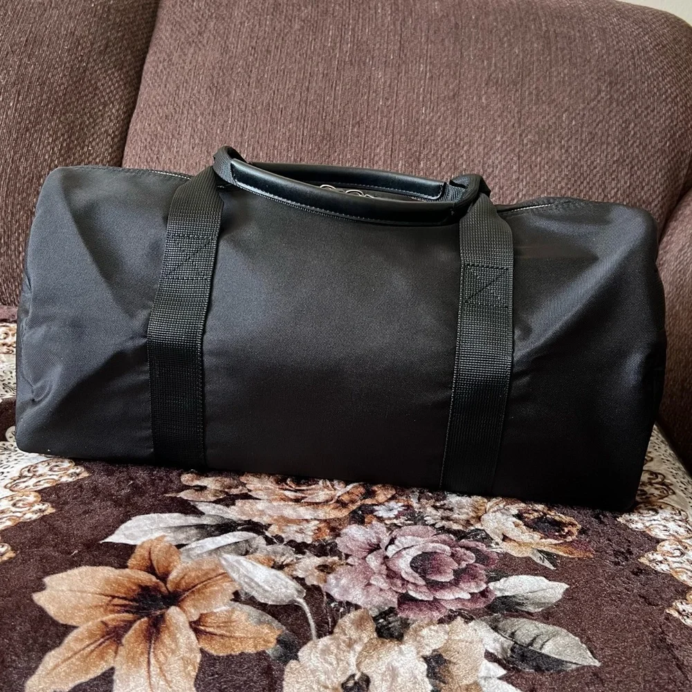 MICHAEL KORS Black Barrel Nylon Detachable Strap Silver-Tone Hardware Duffle Bag